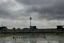 Wet outfield forces early end to match